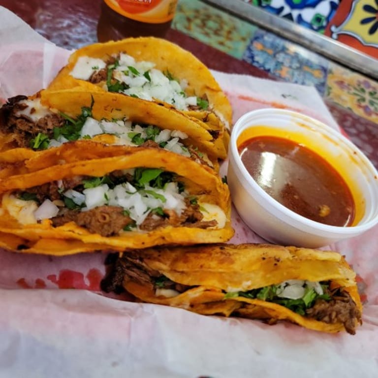 Delicious Birria Tacos Await